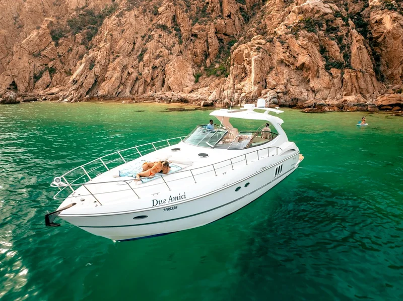 2004 Cruisers 50ft Express — Center console beside Baja's rocky coastline 2004 Cruisers 50ft Express for sale in Cabo San Lucas