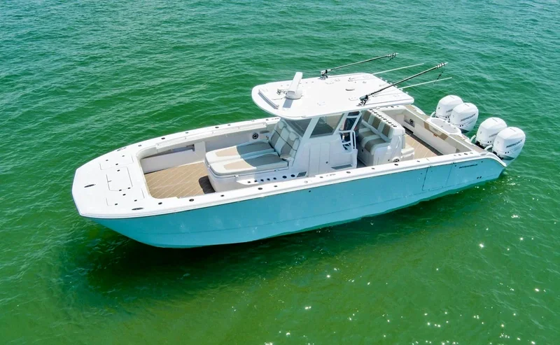 2020 Invincible 37 Catamaran — Aerial view of a center console in green water 2020 Invincible 37 Catamaran — sold in Los Cabos